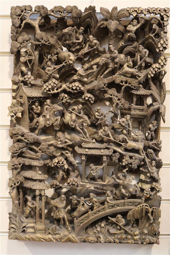 Four Chinese carved giltwood panels of battle scenes